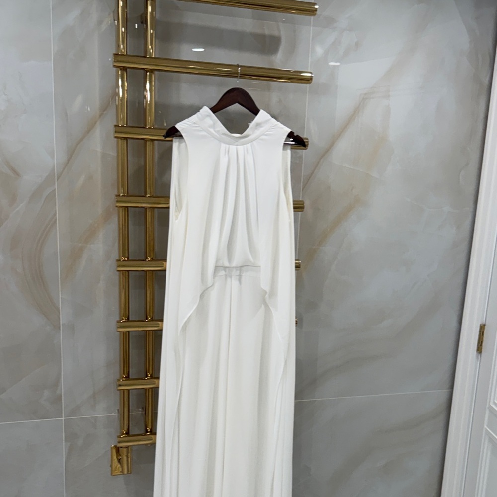 Elegant White Sleeveless Halston romper with cape